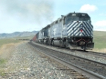 MRL 391 F45 pushing CSX locomotives over Bozeman Pass